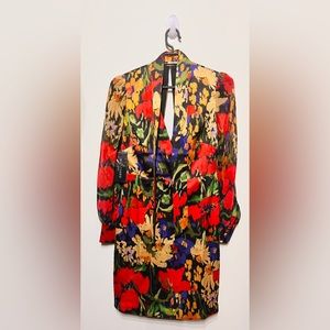 Dazzle this holiday season with the allure of this Guess by Marciano mini dress!